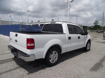 ford f 150 2004 white lariat gasoline 8 cylinders rear wheel drive 4 speed automatic 77532