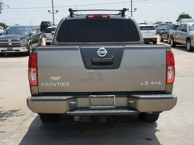 nissan frontier 2005 dk  gray le gasoline 6 cylinders 4 wheel drive automatic 75070