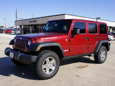 jeep wrangler unlimited 2012 red suv rubicon gasoline 6 cylinders 4 wheel drive automatic 76011