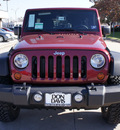 jeep wrangler unlimited 2012 red suv rubicon gasoline 6 cylinders 4 wheel drive automatic 76011