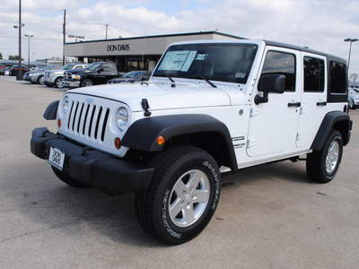 jeep wrangler 2012 white suv unlimited sport gasoline 6 cylinders 4 wheel drive 6 speed manual 76011