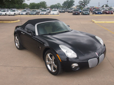 pontiac solstice 2006 black gasoline 4 cylinders rear wheel drive automatic 76049