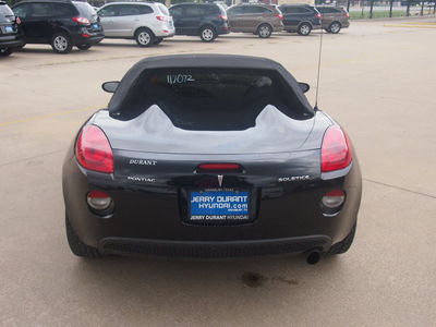 pontiac solstice 2006 black gasoline 4 cylinders rear wheel drive automatic 76049