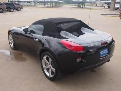 pontiac solstice 2006 black gasoline 4 cylinders rear wheel drive automatic 76049