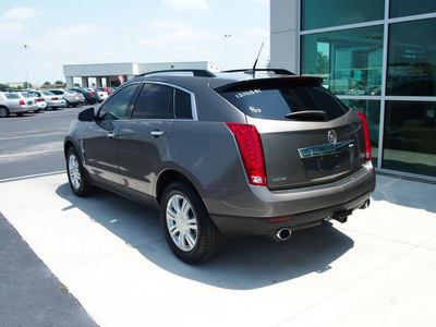 cadillac srx 2011 brown gasoline 6 cylinders front wheel drive 6 speed automatic 76234