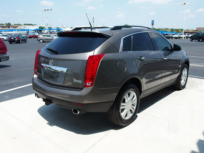cadillac srx 2011 brown gasoline 6 cylinders front wheel drive 6 speed automatic 76234