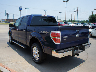 ford f 150 2012 dk  blue 4wd supercrew 145 lariat gasoline 6 cylinders 4 wheel drive 6 speed automatic 75070