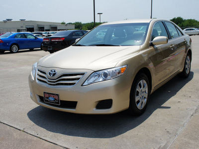 toyota camry 2011 tan sedan le gasoline 4 cylinders front wheel drive shiftable automatic 75070