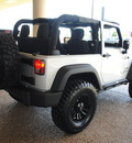 jeep wrangler 2012 silver suv sport gasoline 6 cylinders 4 wheel drive 6 speed manual 76011