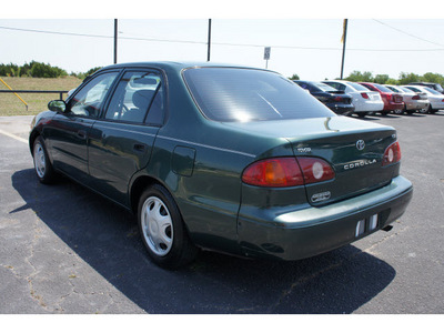 toyota corolla 2002 green sedan ce gasoline 4 cylinders front wheel drive automatic 76543