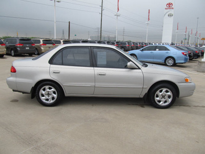 toyota corolla 2000 silver sedan le gasoline 4 cylinders front wheel drive automatic with overdrive 77469