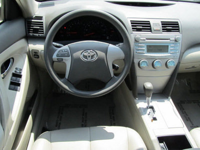 toyota camry 2007 tan sedan le gasoline 4 cylinders front wheel drive automatic with overdrive 77469