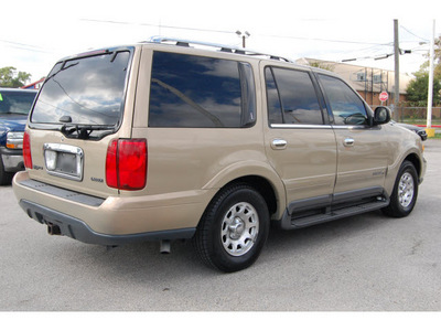 lincoln navigator 1999 gold suv gasoline 8 cylinders rear wheel drive automatic with overdrive 77020