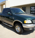 ford f 150 2001 green xlt gasoline 8 cylinders 4 wheel drive automatic with overdrive 76108