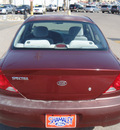 kia spectra 2003 red sedan gasoline 4 cylinders dohc front wheel drive automatic 79936