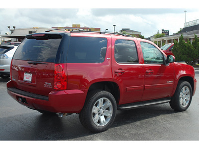 gmc yukon 2012 dk  red suv slt flex fuel 8 cylinders 2 wheel drive automatic with overdrive 77074