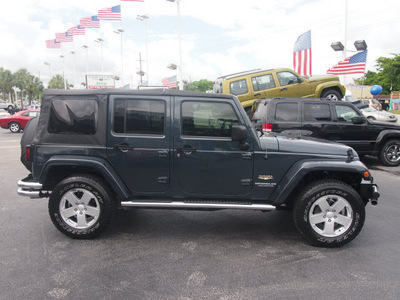 jeep wrangler unlimited 2007 dk  blue suv sahara gasoline 6 cylinders 4 wheel drive automatic 33021
