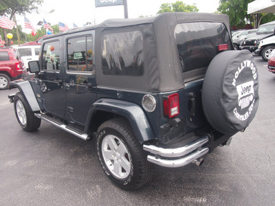 jeep wrangler unlimited 2007 dk  blue suv sahara gasoline 6 cylinders 4 wheel drive automatic 33021