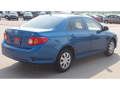 toyota corolla 2009 blue sedan le gasoline 4 cylinders front wheel drive automatic with overdrive 77864