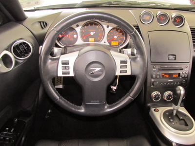 nissan 350z 2008 silver coupe touring gasoline 6 cylinders rear wheel drive shiftable automatic 77477