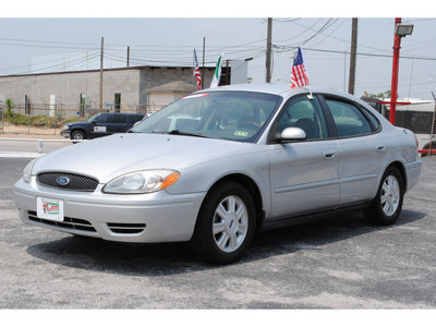 ford taurus 2005 silver sedan sel gasoline 6 cylinders front wheel drive automatic with overdrive 77023