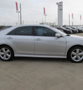 toyota camry 2011 silver sedan se gasoline 4 cylinders front wheel drive automatic with overdrive 77469