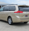 toyota sienna 2011 tan van le 8 passenger gasoline 6 cylinders front wheel drive automatic with overdrive 77469