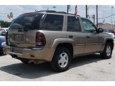 chevrolet trailblazer 2002 lt  brown suv ls gasoline 6 cylinders rear wheel drive automatic with overdrive 77020