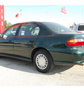 chevrolet malibu 2002 dk  green sedan gasoline 6 cylinders front wheel drive automatic 77020