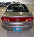 chevrolet cavalier 2004 gold sedan gasoline 4 cylinders front wheel drive automatic 79935