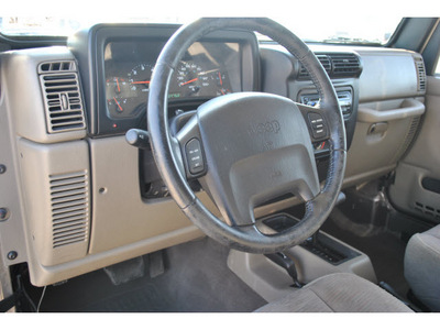 jeep wrangler 2003 beige suv rubicon gasoline 6 cylinders 4 wheel drive automatic 78130