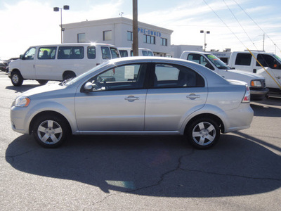 chevrolet aveo 2011 silver sedan gasoline 4 cylinders front wheel drive automatic 79936