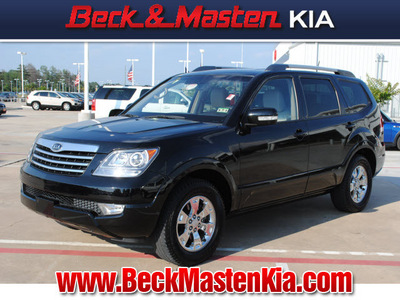 kia borrego 2009 black suv ex gasoline 6 cylinders 2 wheel drive automatic 77375