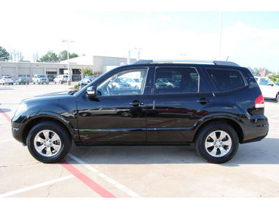 kia borrego 2009 black suv ex gasoline 6 cylinders 2 wheel drive automatic 77375