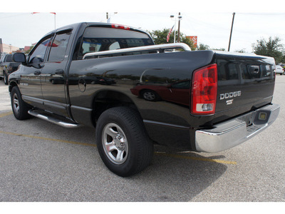 dodge ram pickup 1500 2002 black pickup truck slt gasoline 8 cylinders rear wheel drive automatic 77087