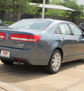 lincoln mkz hybrid 2012 lt  blue sedan hybrid 4 cylinders front wheel drive automatic with overdrive 77074