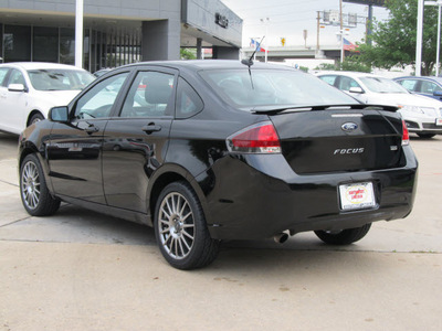 ford focus 2011 black sedan sport ses gasoline 4 cylinders front wheel drive automatic with overdrive 77074