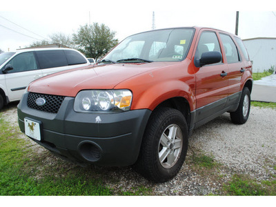 ford escape 2006 orange suv xls gasoline 4 cylinders all whee drive standard 77531