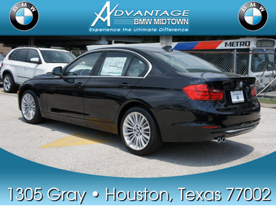 bmw 328i 2012 black sedan gasoline 4 cylinders rear wheel drive automatic 77002