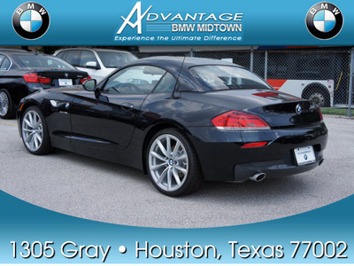 bmw z4 2012 black sdrive35i gasoline 6 cylinders rear wheel drive automatic 77002