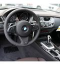 bmw z4 2012 black sdrive35i gasoline 6 cylinders rear wheel drive automatic 77002