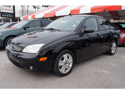 ford focus 2005 black sedan zx4 gasoline 4 cylinders front wheel drive 5 speed manual 33157