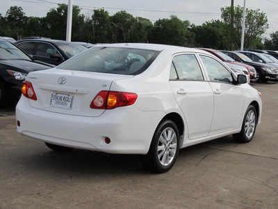 toyota corolla 2010 white sedan le gasoline 4 cylinders front wheel drive automatic with overdrive 77074