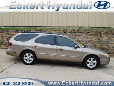ford taurus 2003 beige wagon se gasoline 6 cylinders front wheel drive automatic 76210