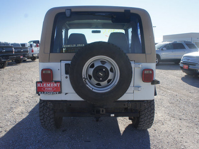 jeep wrangler 1991 white gasoline 6 cylinders 4 wheel drive 5 speed manual 76234
