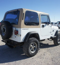 jeep wrangler 1991 white gasoline 6 cylinders 4 wheel drive 5 speed manual 76234