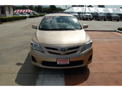 toyota corolla 2011 tan sedan le gasoline 4 cylinders front wheel drive automatic with overdrive 77706