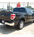 ford f 150 2011 black xlt flex fuel 8 cylinders 2 wheel drive automatic with overdrive 77657