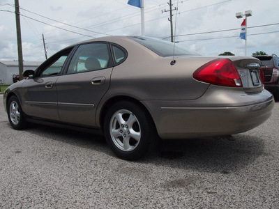 ford taurus 2002 gold sedan se gasoline 6 cylinders front wheel drive 4 speed automatic 77532