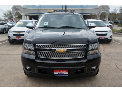 chevrolet suburban 2012 black suv lt 1500 flex fuel 8 cylinders 2 wheel drive automatic with overdrive 77566